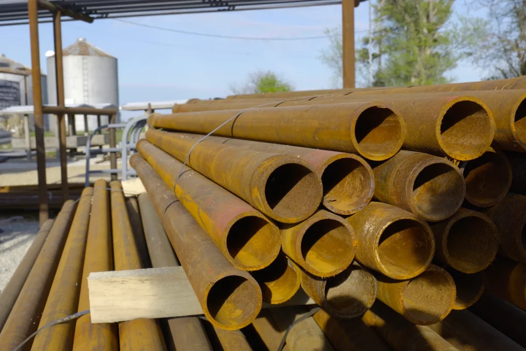 Oil well pipes stored at Dutchman’s Farm Supply in Versailles, Missouri.